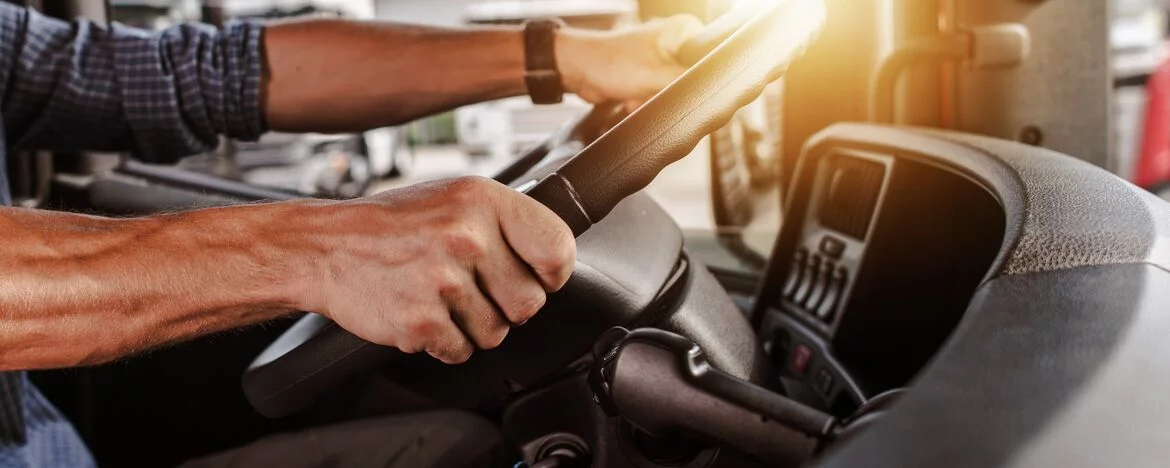 Hands on steering wheel